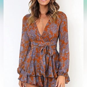 Floral, purple and orange romper.